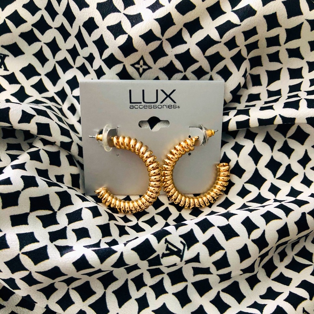 Gold hoops with a twist !